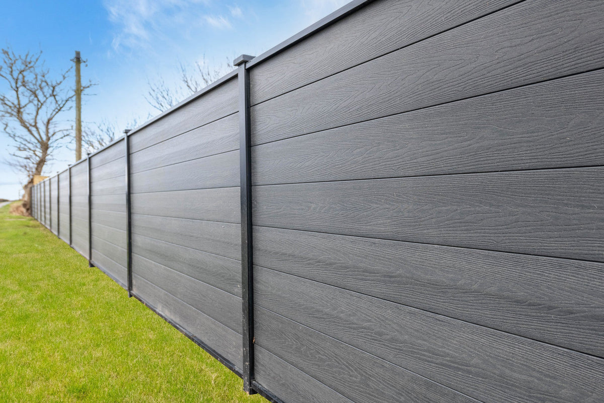 Completed DuraPost VISTA fence showing the aluminium frame and Black posts
